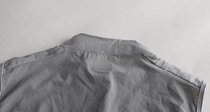 Chaleco Corta Viento Gris TopStone lateral – ciclismo Costa Rica