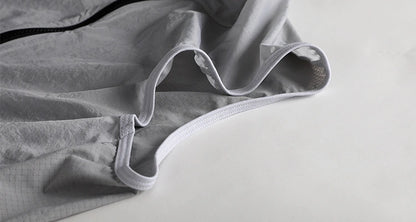 Chaleco Corta Viento Gris TopStone detalle zipper – ciclismo Costa Rica
